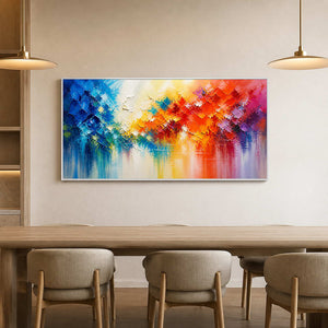 Vibrant textured panoramic wall art displayed above a light wood dining table.