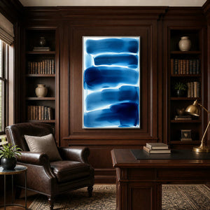 Saturated blue modern abstract painting displayed in a refined dark wood office.