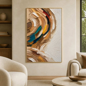Textured earth-tone abstract wall art in a calm modern living room.