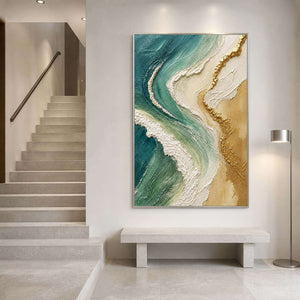 Emerald coastal artwork displayed beside a cool white stone staircase.