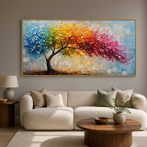 Textured rainbow tree wall art displayed in a modern living room.