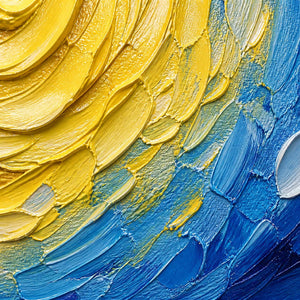 Close-up of layered yellow, blue, and white palette-knife texture.