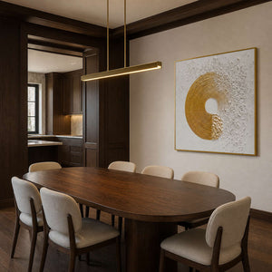 Gold textured abstract wall art displayed in an elegant modern dining room