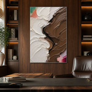 Textured earth-tone abstract painting in a dark wood home office.