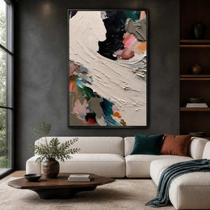 Expressive textured abstract wall art displayed in a dramatic modern living room.