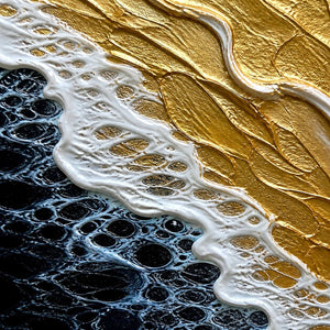 Close-up of gold impasto, raised white foam, and dark blue-black water texture.