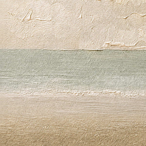 Close-up of raised ivory, pale green, and sand texture.