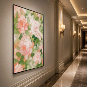 Vertical blush rose wall art displayed along an elegant hallway.