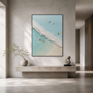Turquoise coastal wall art displayed in a light gray modern entryway.