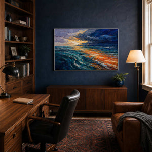 Textured ocean artwork displayed in a navy home office.