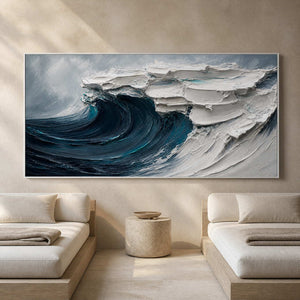 Deep teal coastal artwork displayed in a serene seaside spa lounge.