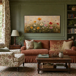 Textured floral wall art bringing warm color to a country living room.