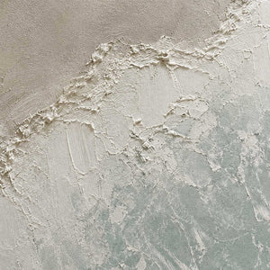 Close-up of raised ivory texture and pale blue brushwork.