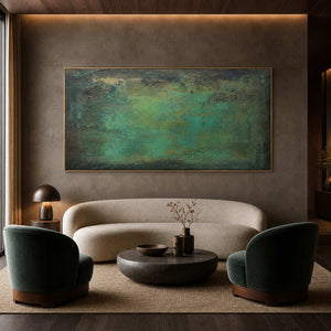 Atmospheric green textured wall art in a forest-toned hotel lobby.