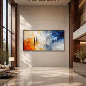 Large orange and blue abstract painting displayed in a contemporary hotel lobby.