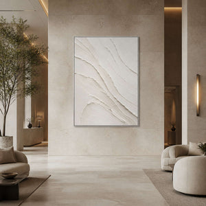 Vertical minimalist wall art displayed in a greige boutique hotel lobby.