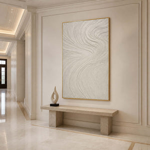 Vertical white textured wall art displayed in an elegant luxury entryway.