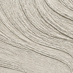 Close-up of flowing hand-worked ridges in chalk white and pale stone.