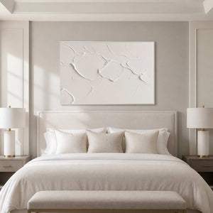 Calm ivory textured wall art displayed above a luxury primary bedroom.