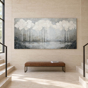 Hand-painted textured landscape wall art in white, pearl gray, and charcoal, displayed beside a staircase without an outer frame.