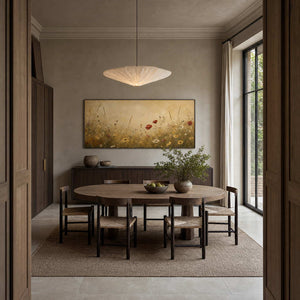 Golden wildflower wall art displayed in a refined neutral dining room.