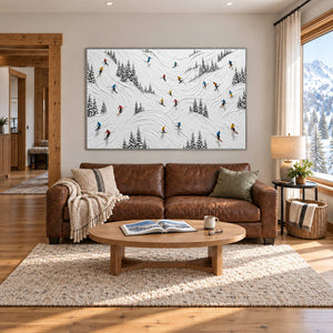 Winter at Play in a silver frame above a brown leather sofa in a wood-accented living room.