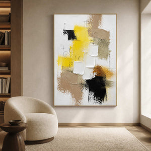 Modern yellow abstract wall art displayed in a warm reading lounge.