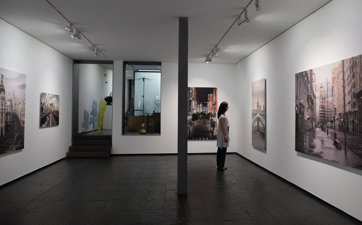 The AURLONA team reviewing a painting