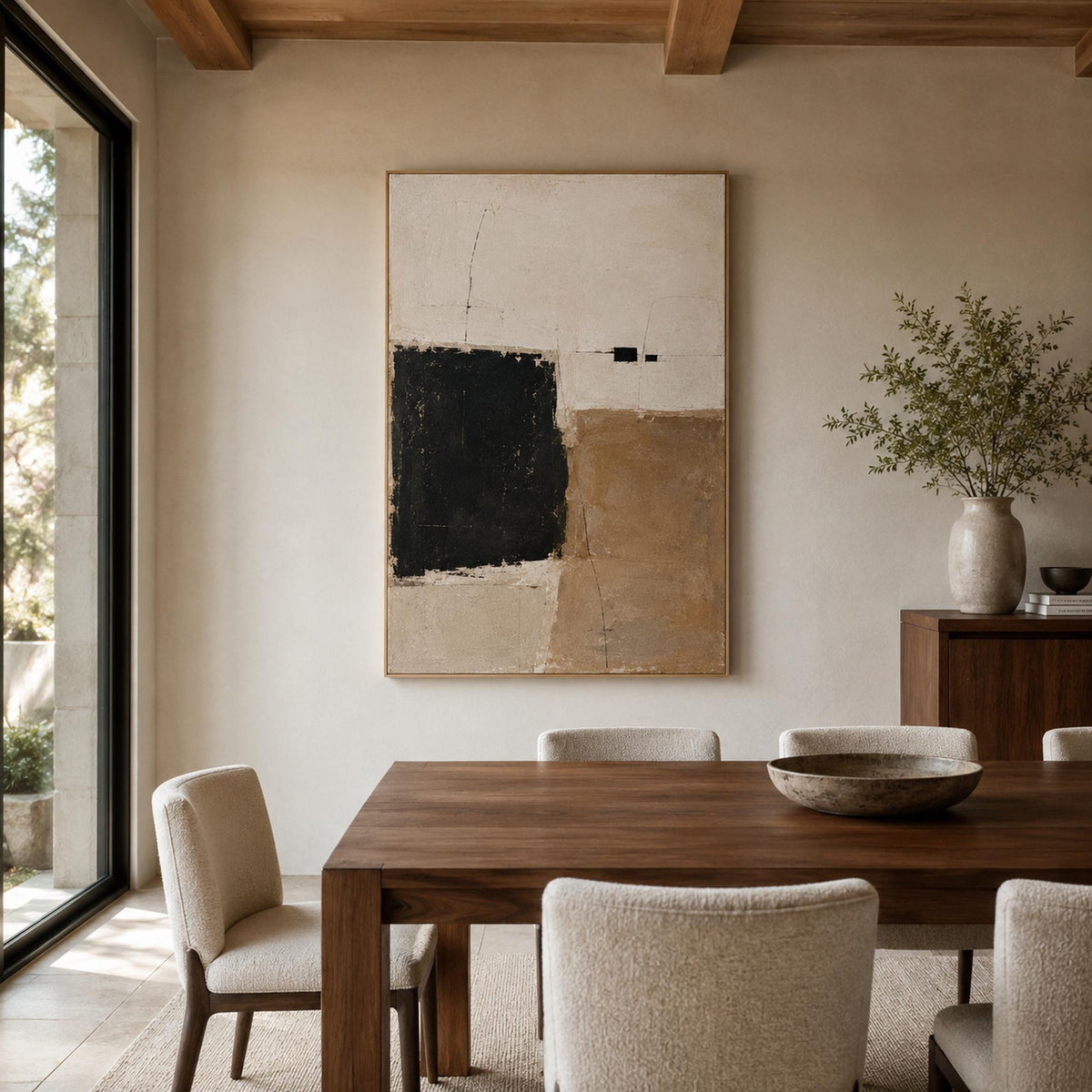 Black and beige abstract canvas in a refined dining room.