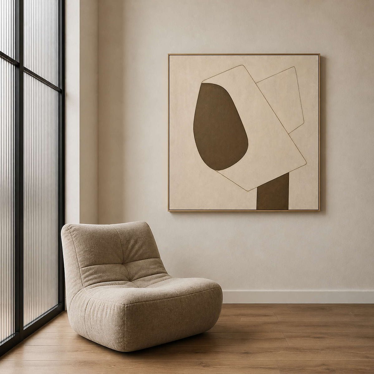 Minimalist cream canvas beside a sculptural chair in a reading nook.