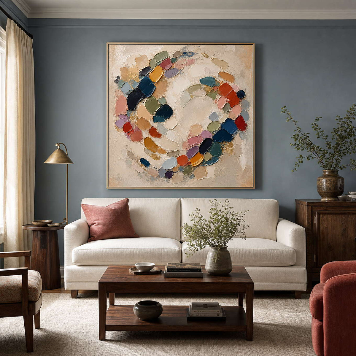 Textured multicolor abstract wall art styled above a refined living room sofa.