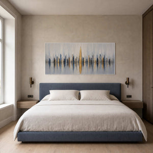 Textured cityscape wall art displayed in a serene bedroom.