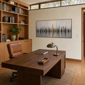 Textured cityscape wall art displayed in a refined home office.