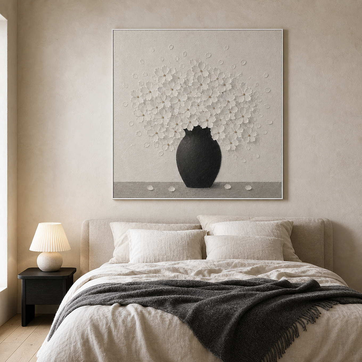Textured white floral wall art displayed in a soft wabi sabi bedroom.