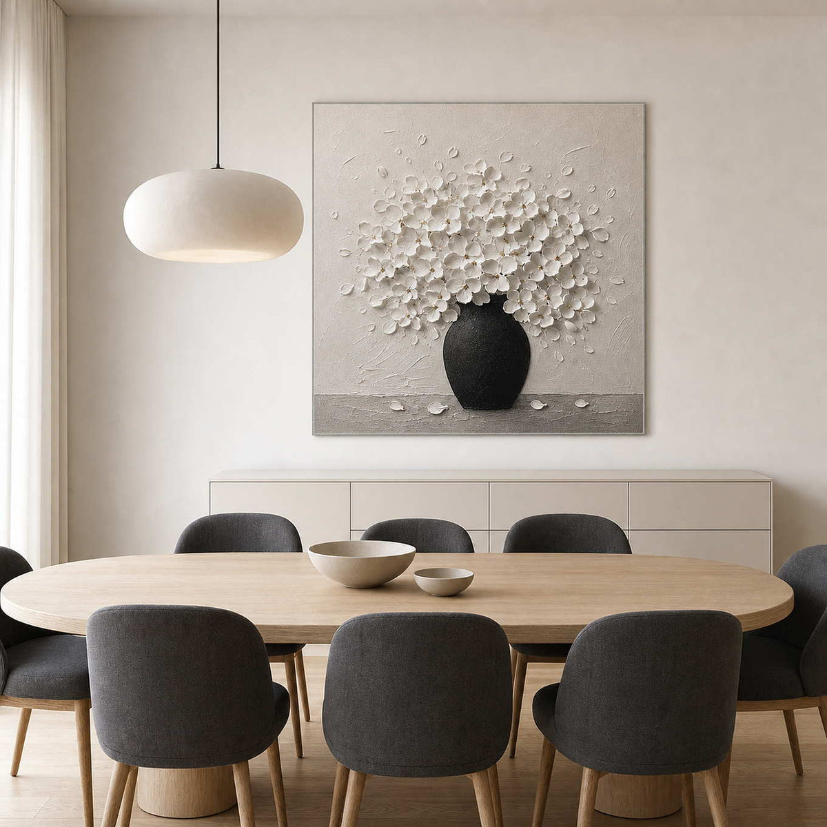 Textured white floral wall art displayed in a Nordic dining room.