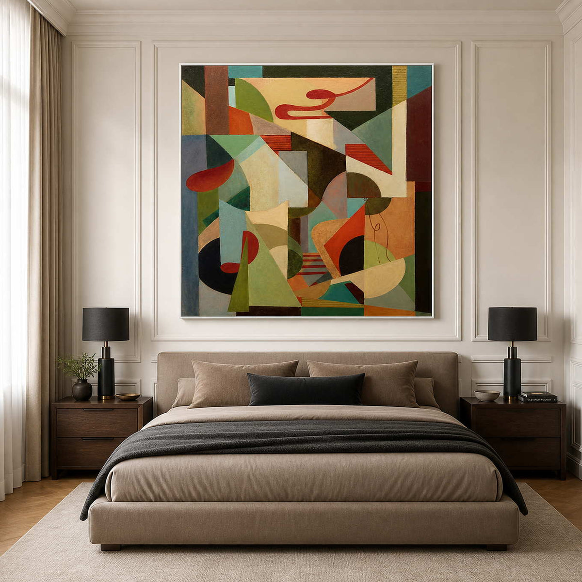 White-framed geometric abstract painting centered above a taupe bed on a white paneled bedroom wall.