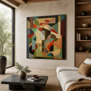 A Colorful Chorus in a black frame above a cream sofa, with geometric green, blue, and ochre forms in a bright living room.
