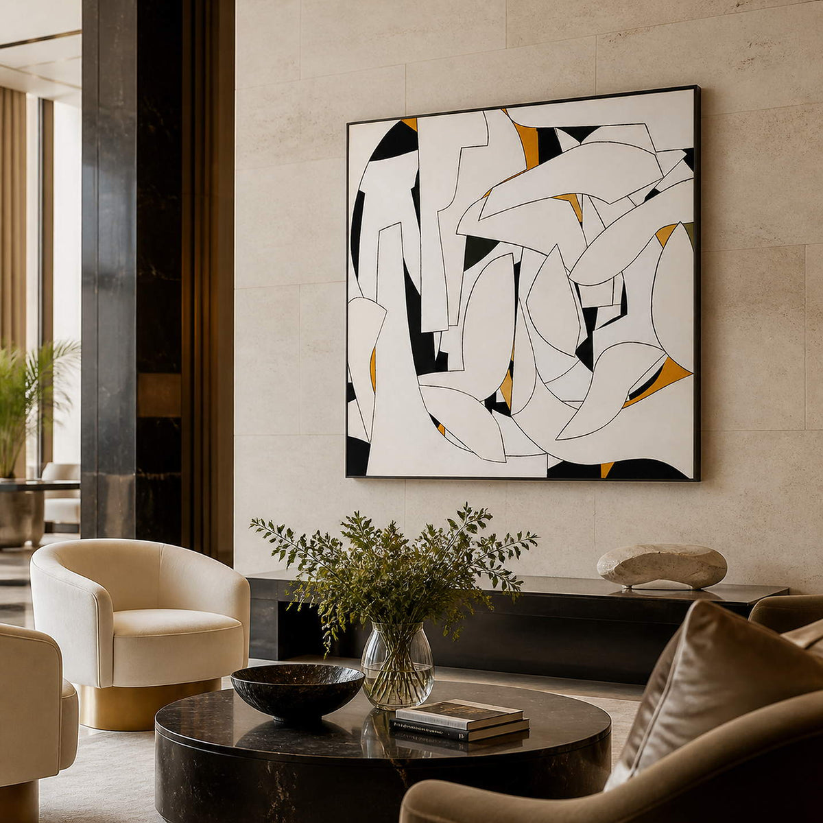Black-framed geometric artwork overlooking a lounge coffee table.