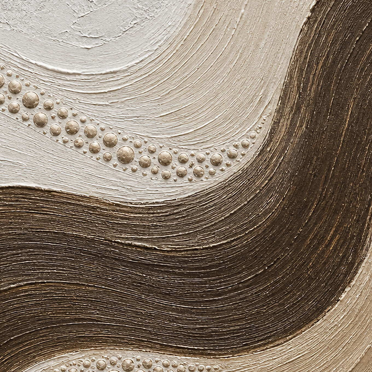 Close-up of the painted texture in dark brown current through sand and ivory.