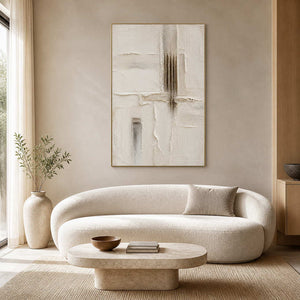 Ivory textured minimalist wall art in a warm contemporary living room.