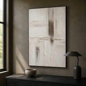 Vertical ivory abstract artwork bringing focus to a dark office.