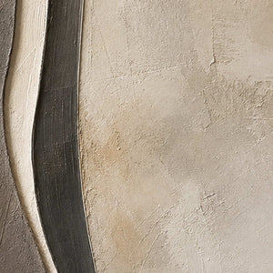 Close-up of raised hand-painted texture in black, neutral, and white.