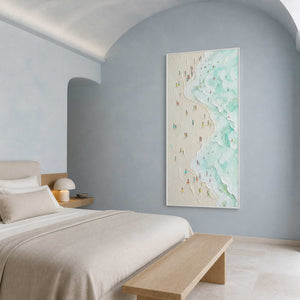 Vertical coastal wall art styled in a soft blue arched bedroom.