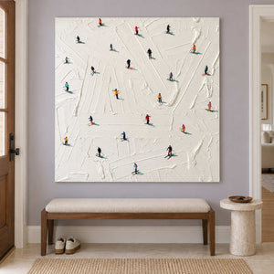 White skier artwork above a cream bench against a lilac wall.