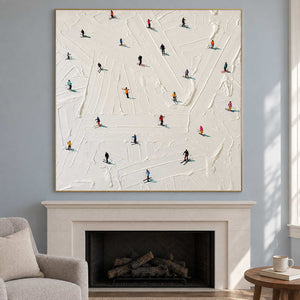Square skiing painting above a white fireplace on a blue wall.