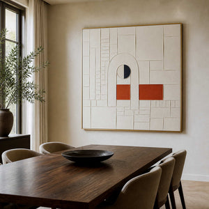 Architectural abstract artwork displayed above a walnut and ivory dining room.