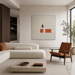 Modern geometric wall art displayed in a warm gray stone living room.