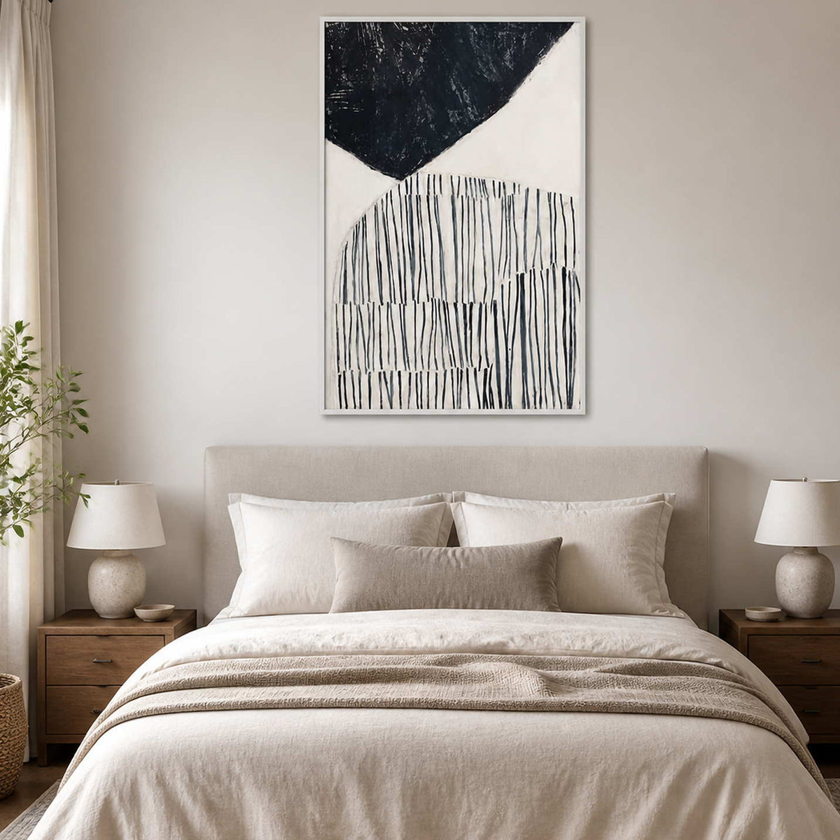 White framed abstract painting with dark curves and fine lines above a bed.