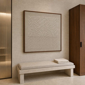 Neutral textured wall art displayed in a hotel spa bathroom dry area.