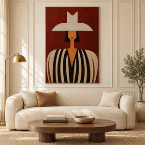 Modern portrait wall art in a living room with a gold metal frame